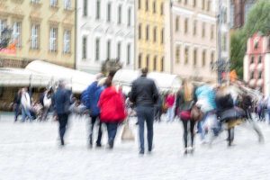 Urban move, people walking in city, motion blur, zoom effect