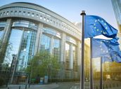 European union flag against parliament in Brussels