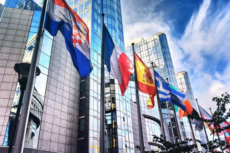 Flags in front of European Parliament building. Brussels, Belgiu