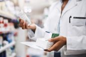 Cropped shot of an unrecognizable young female pharmacist working in a pharmacy.